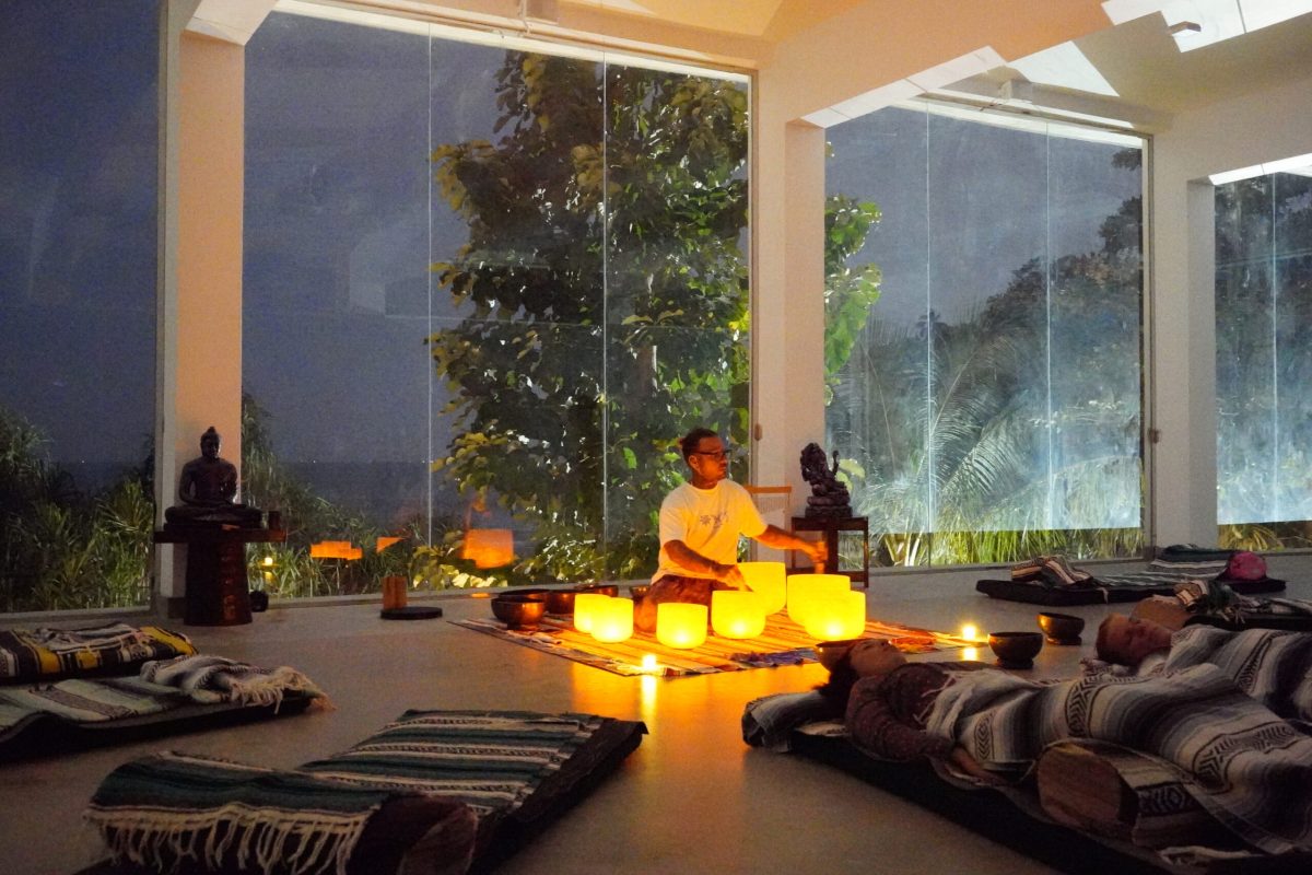 Candlelit sound healing session with crystal singing bowls at Talalla Retreat, Sri Lanka